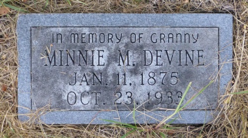 The grave of Minnie Devine, a granny, is one of only two markers bearing a name instead of a number.